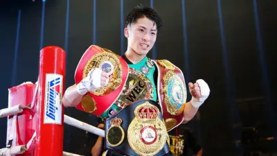 Naoya with his 4 belts